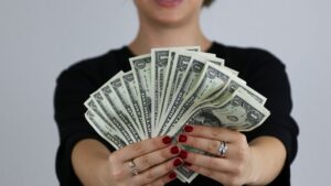 woman with money in her hands